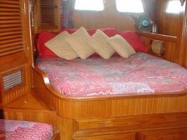 Two equal masters aft w/removable wall for 1 large cabin