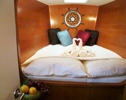 Port aft Stateroom Queen Bed with ensuite head-