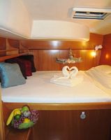 Starboard Guest aft Stateroom Queen bed with ensuite head.