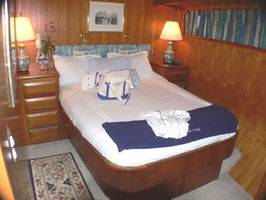 Port Stateroom, with a queen size bed, LCD TV, DVD, lots of room and granite counters bathroom