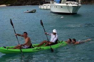 Guests enjoying a family kayak/tow trip