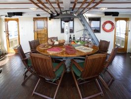Aft Deck Dining for 8. This area can be fully enclosed.