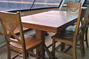 Aft Deck. This table comfortably seats 6 and can extend to seat 8. This area is fully heated and doors to the main salon can be open.