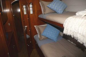 Twin bunk beds on port side